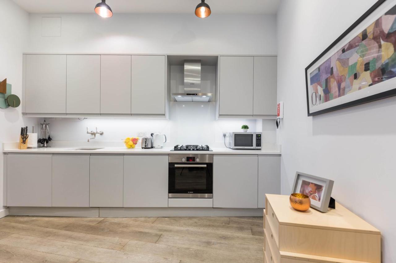 Urban Chic - Rathbone Apartment London Bagian luar foto