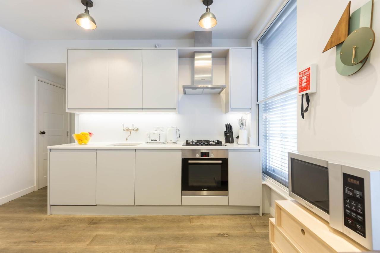 Urban Chic - Rathbone Apartment London Bagian luar foto